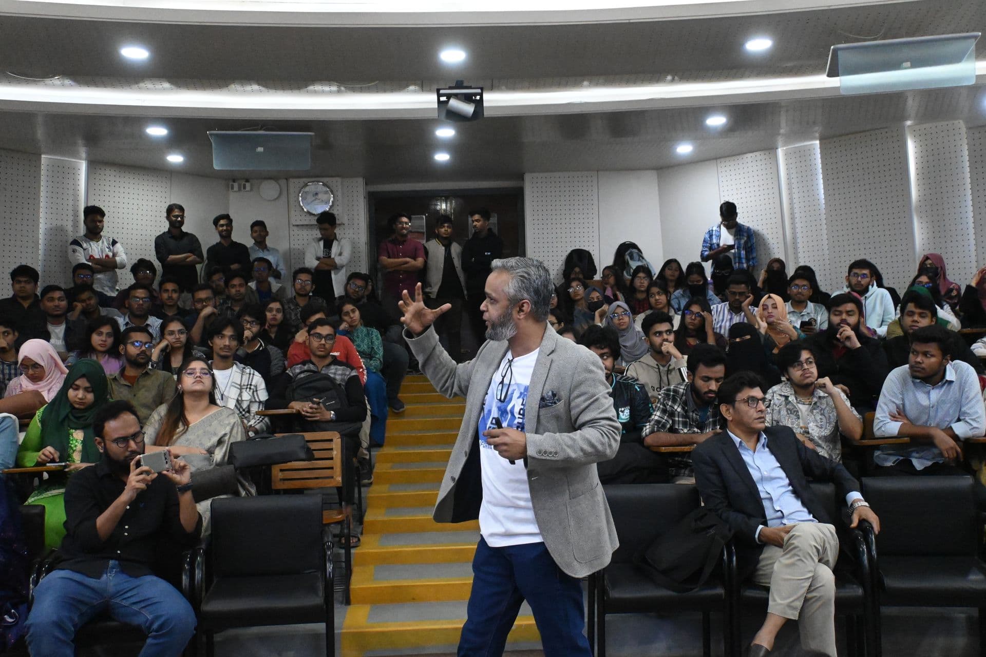 CEO Md. Rajibul Islam presenting Odoo ERP to a packed hall at East West University